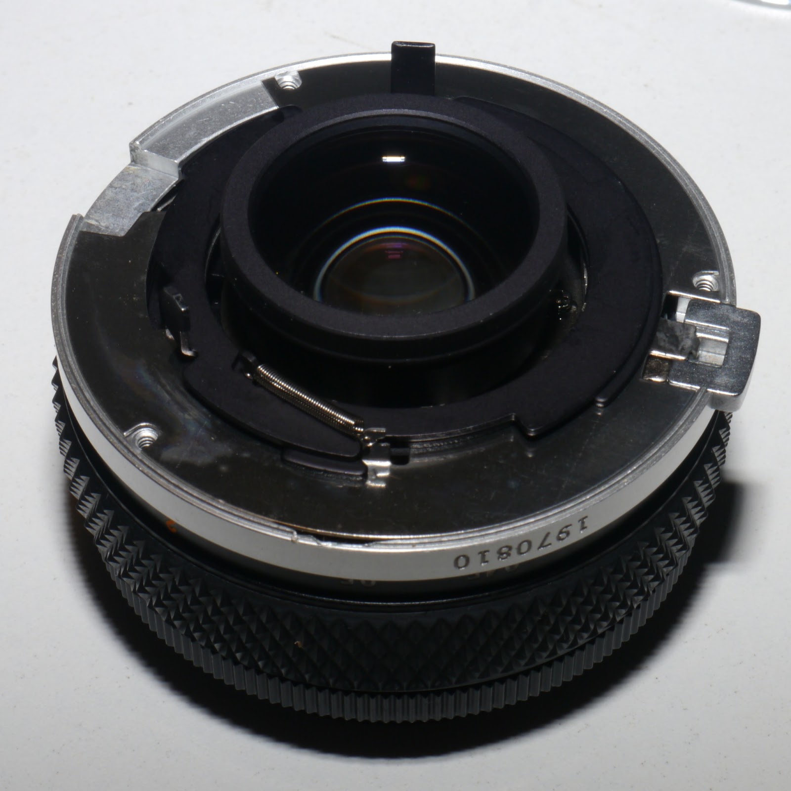 Lens mount removed, showing the unlock lever