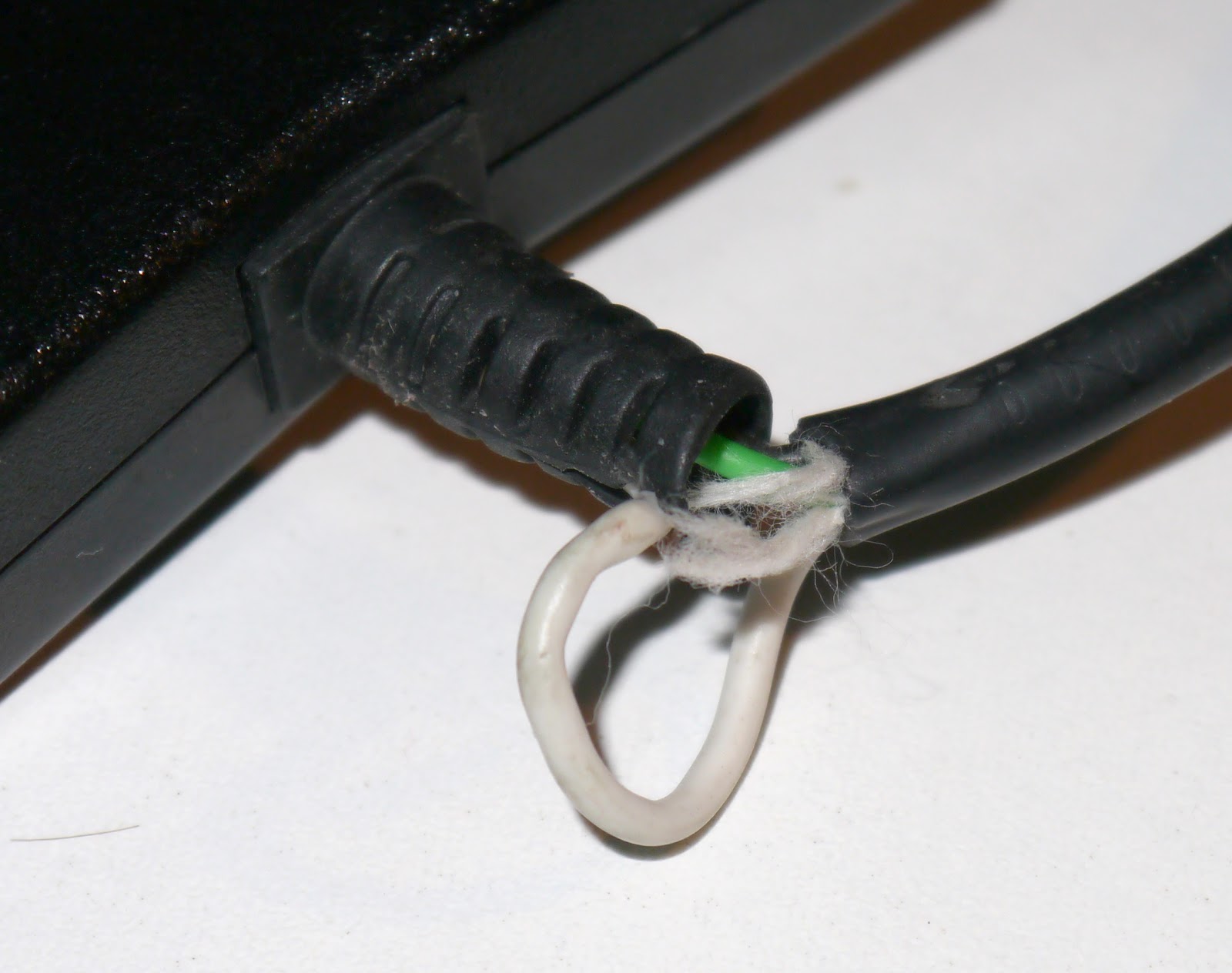 Exposed wires on the charger.