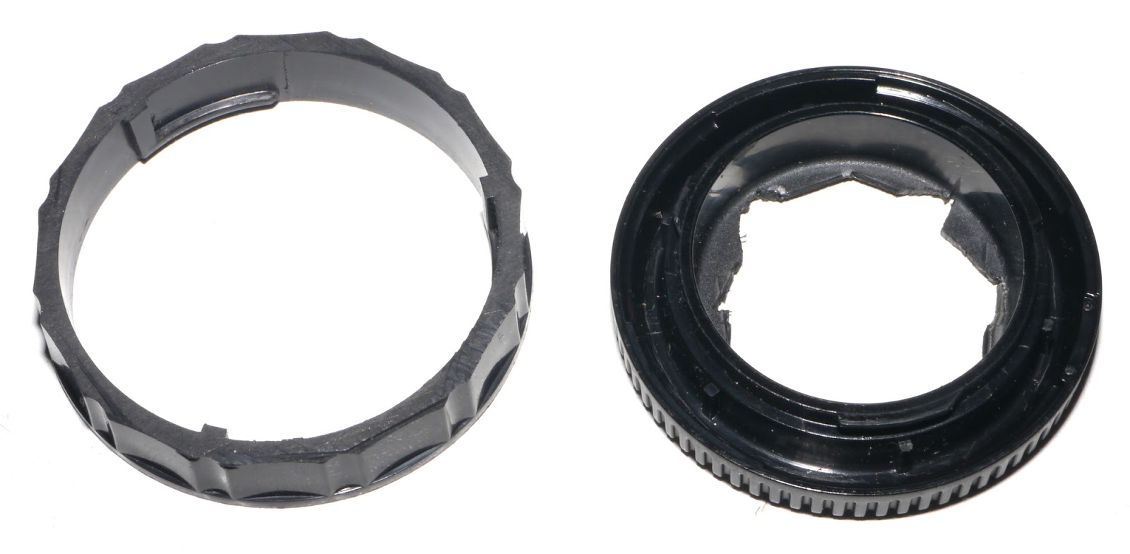 Left: Olympus OM lens cap. The flat part is cut off with a saw. Right: Micro Four Third body cap, the hole was (painfully) open with a cutter, then using a saw.